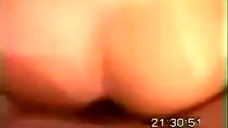 Cock hungry amateur brunette is busy with giving a solid blowjob to a fat cock
