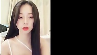 Beautiful asian girl on phone